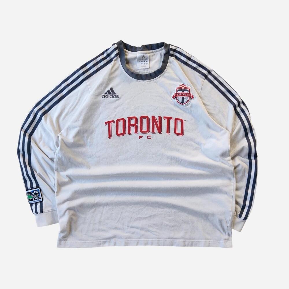 Adidas Toronto FC soccer jersey with red 'TORONTO FC' text and team crest